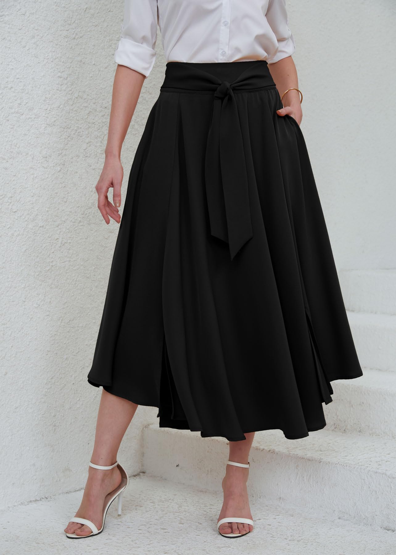 Front view of the flattering A-line silhouette of the black satin swing skirt for women