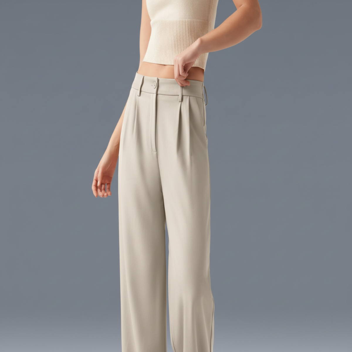 The model's hands are holding the pants while wearing the Chiriya Women's High Waist Wide Leg Work Pants, and the model's face is not visible.