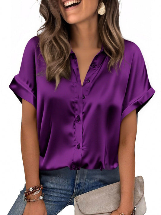 Close-up of Zeagoo women's purple satin button-down blouse showing the silky texture and cuffed sleeves.