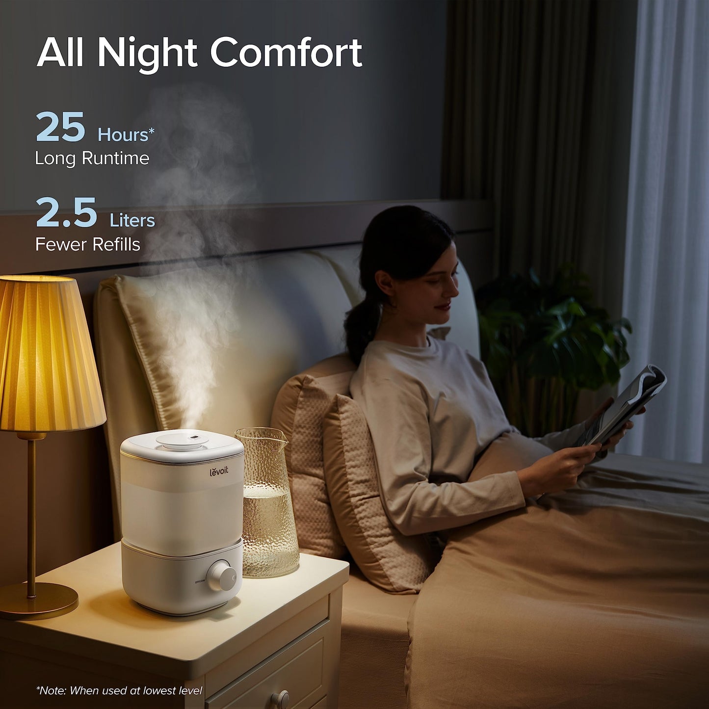 A woman resting in bed with the LEVOIT humidifier running, showcasing its 25-hour runtime.